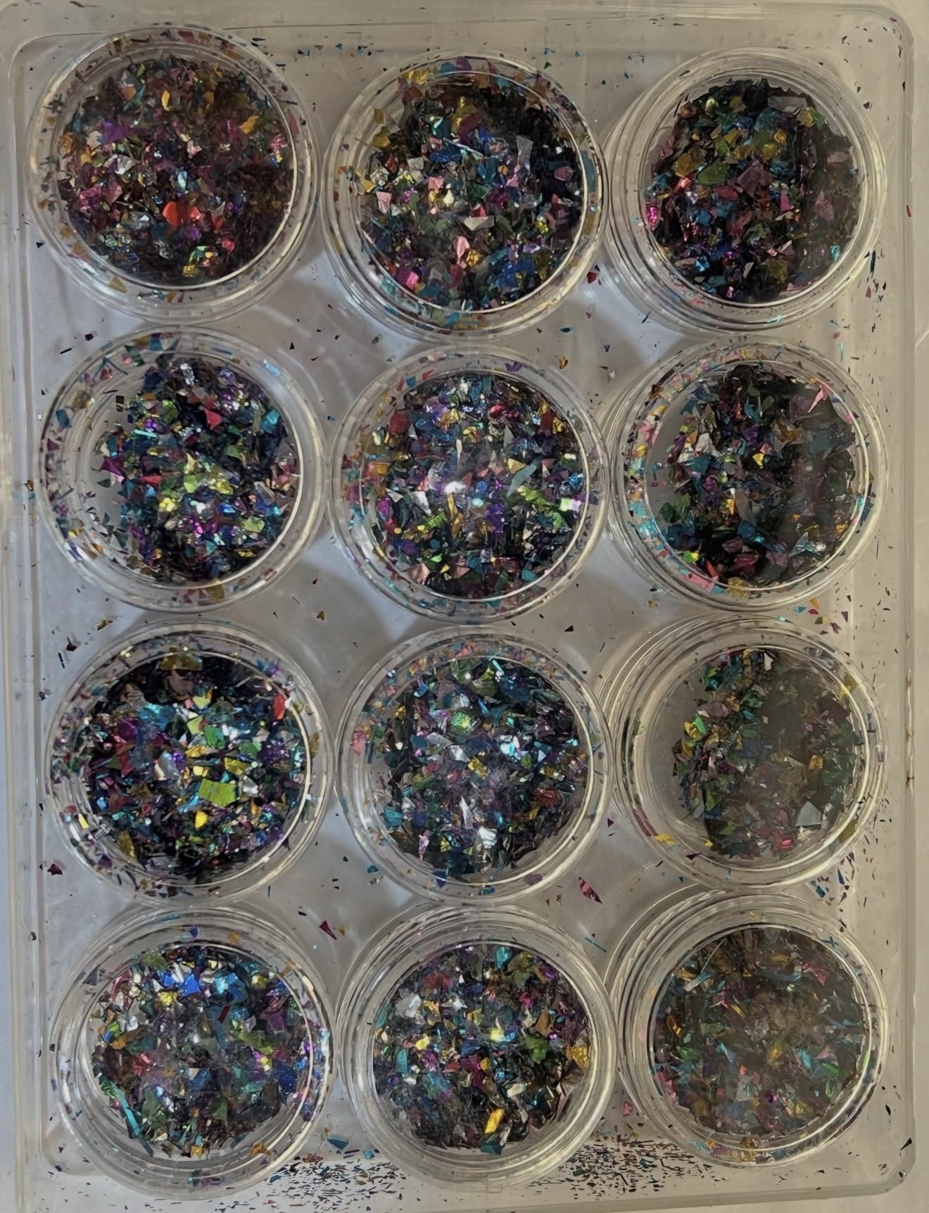 Flakes dekorative holografike për nail art